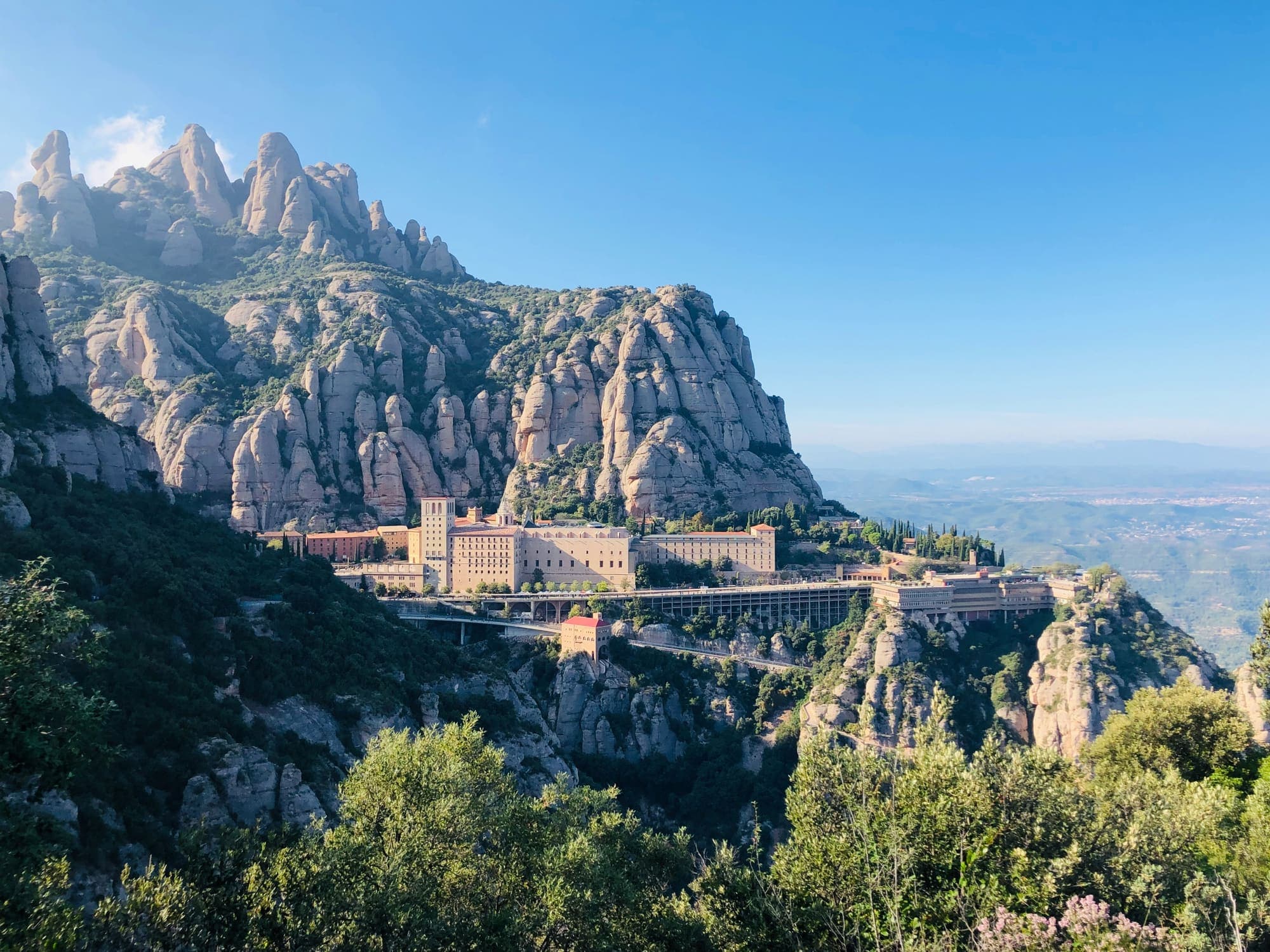 Montserrat monastery beneath the jagged mountain peaks near Barcelona