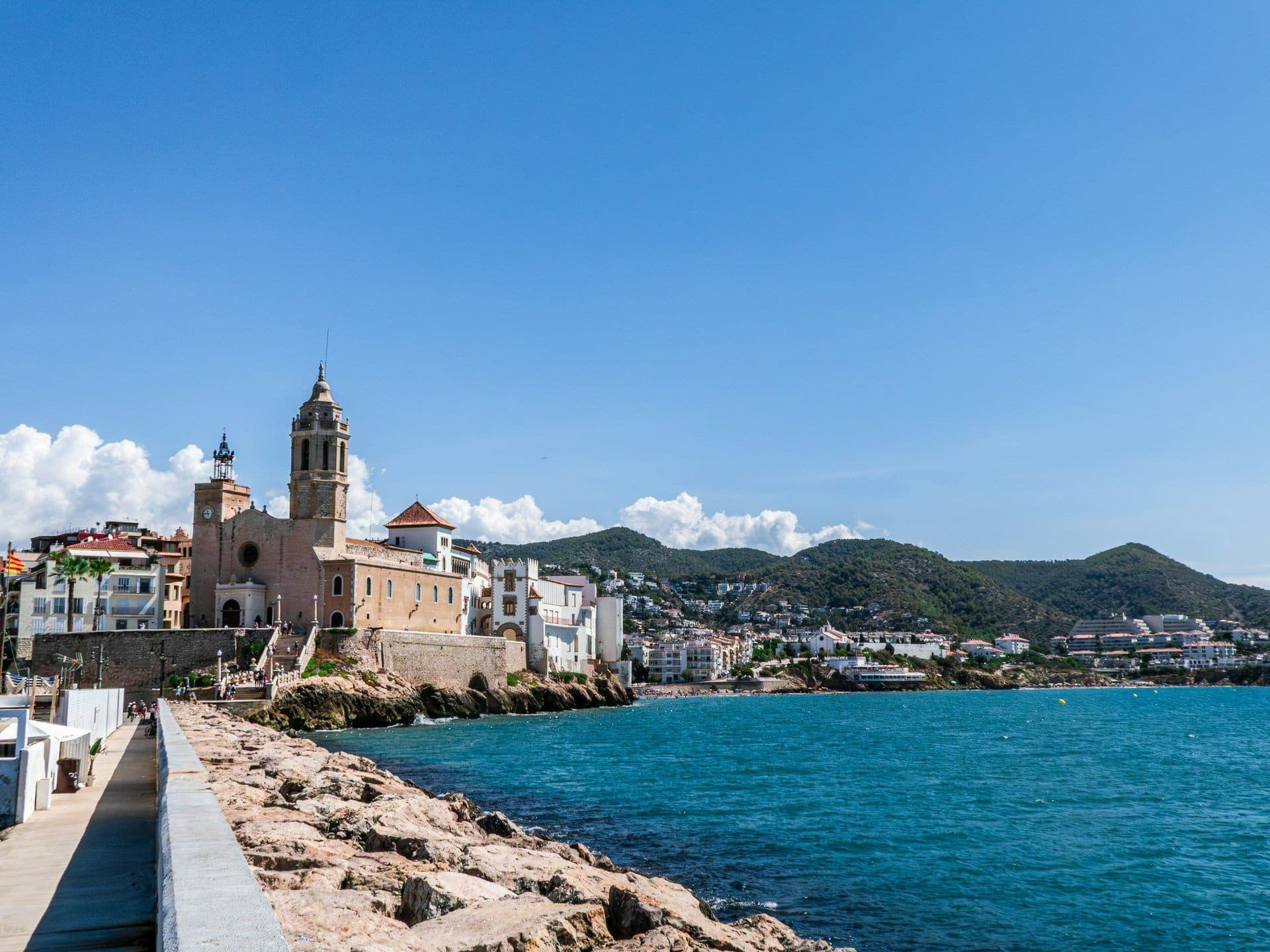 Sitges seafront with the church of Sant Bartomeu above the beach